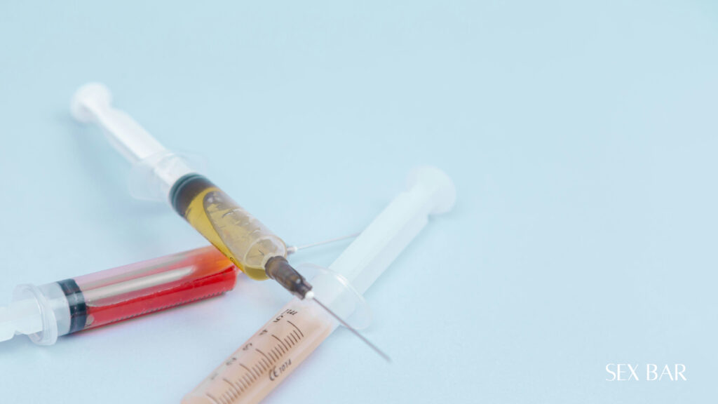 A syringe and needle, symbolizing medical treatments and prevention